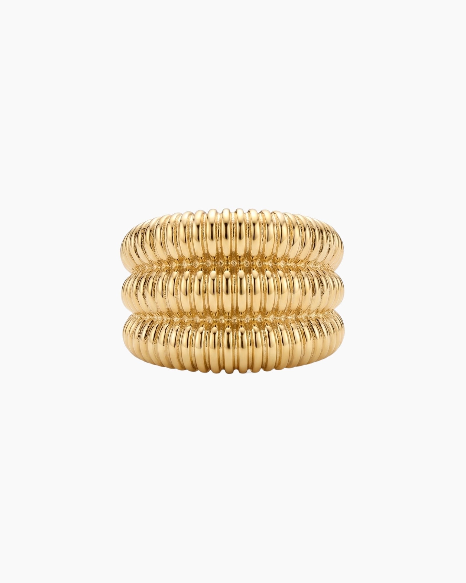 Gold Dara ribbed statement ring in 18k gold PVD stainless steel on a white background, designed for shoppers looking for a bold, tarnish-resistant everyday ring that adds polish to simple outfits.