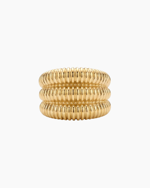Gold Dara ribbed statement ring in 18k gold PVD stainless steel on a white background, designed for shoppers looking for a bold, tarnish-resistant everyday ring that adds polish to simple outfits.