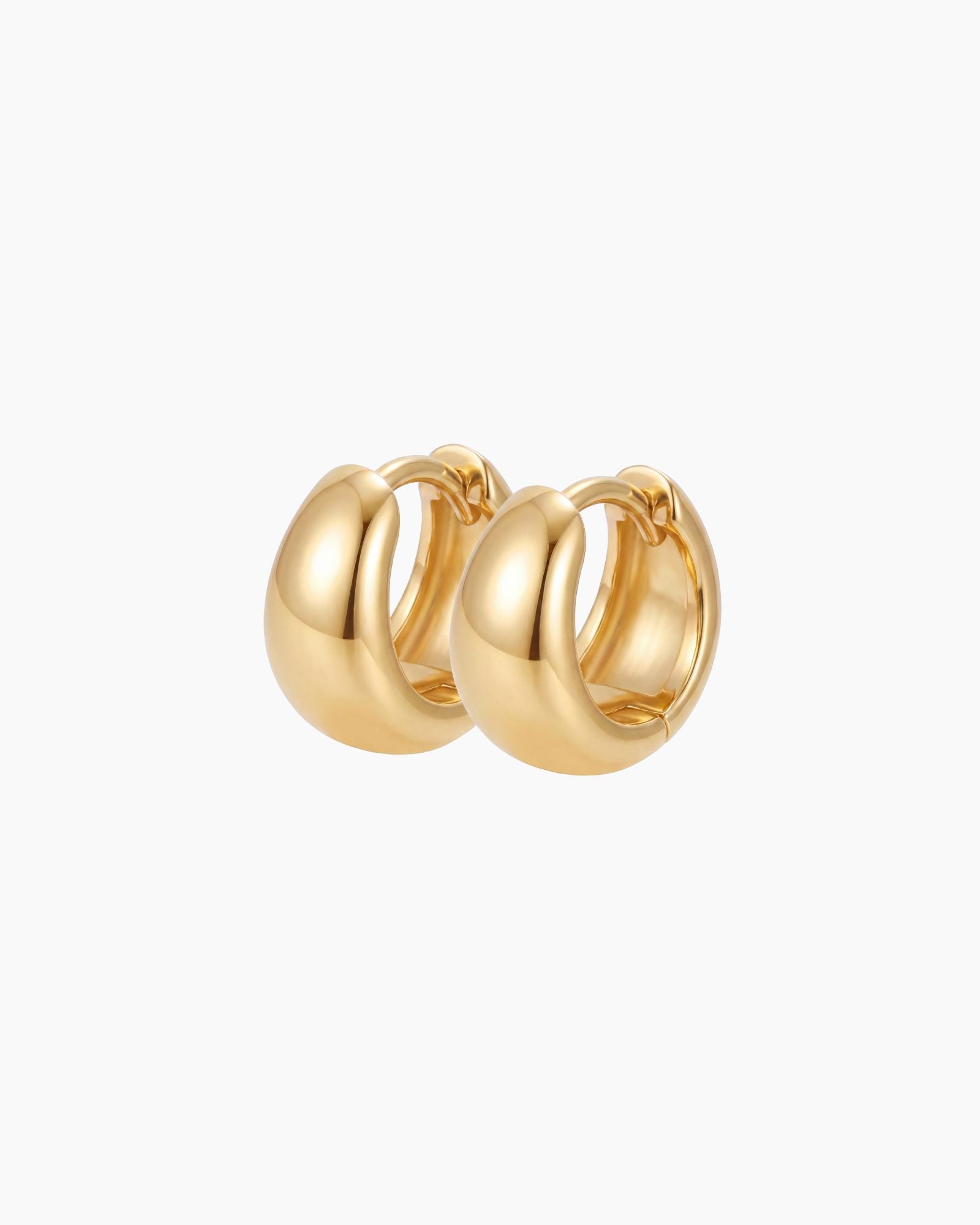 Gold rounded hoop earrings in a chunky polished design on a white background. Classic everyday sterling silver hoops with micron 18k gold plating, perfect for minimal jewellery styling, layered ear stacks and lightweight comfortable daily wear.