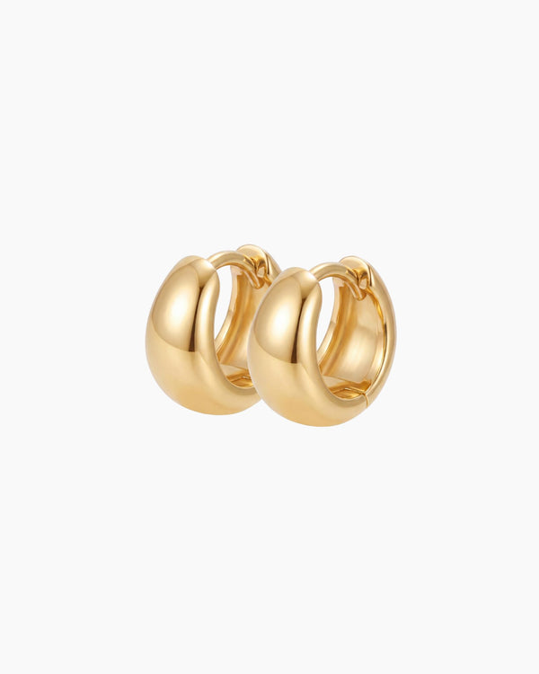 Gold rounded hoop earrings in a chunky polished design on a white background. Classic everyday sterling silver hoops with micron 18k gold plating, perfect for minimal jewellery styling, layered ear stacks and lightweight comfortable daily wear.