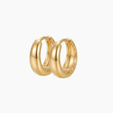 SELENE rounded gold hoop earrings on a white background. Classic chunky hoop earrings crafted from sterling silver with micron 18k gold plating, designed for lightweight everyday wear, minimal jewellery styling and timeless layered looks.