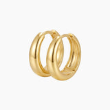 SELENE rounded gold hoop earrings on a white background featuring a polished chunky dome design. Sterling silver hoop earrings with micron 18k gold plating, ideal for everyday wear, sensitive ears, minimal jewellery styling and timeless layered looks.