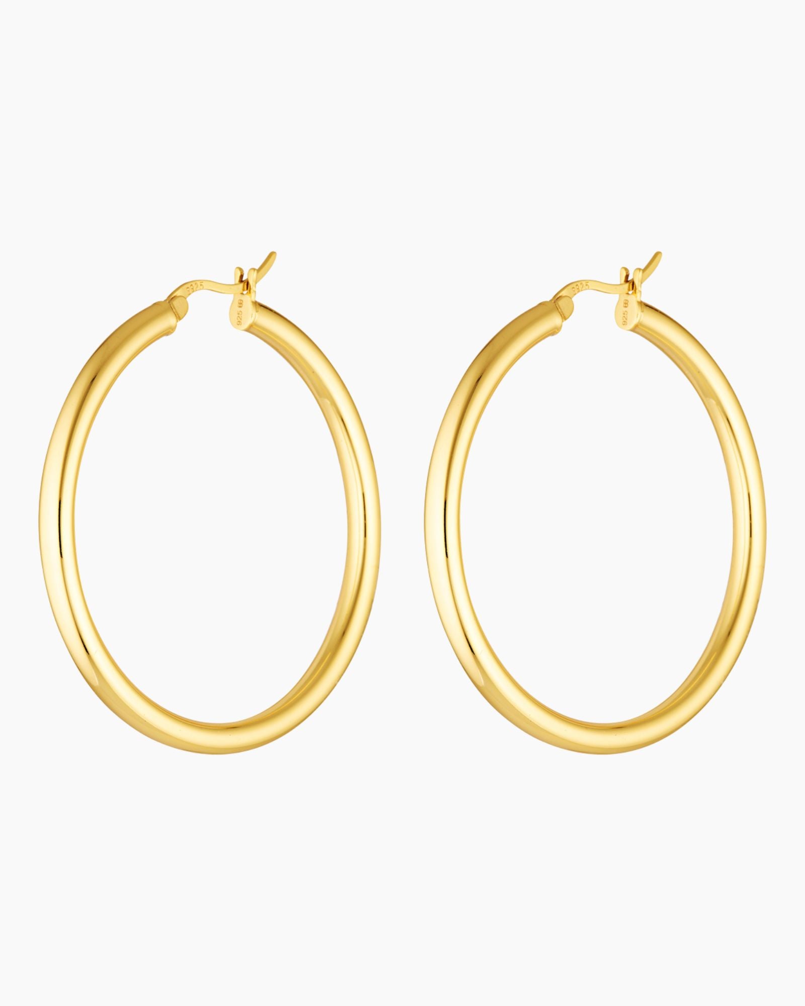 Studio product image of Aria large gold hoop earrings shown as a matching pair on a white background. Lightweight 40mm hollow gold hoops with a smooth polished finish, designed for everyday wear and sensitive ears, offering bold impact without heaviness.