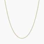 Dainty gold filled curb chain necklace by House of Slani displayed on a white background, featuring fine polished links designed for layering or adding charms.