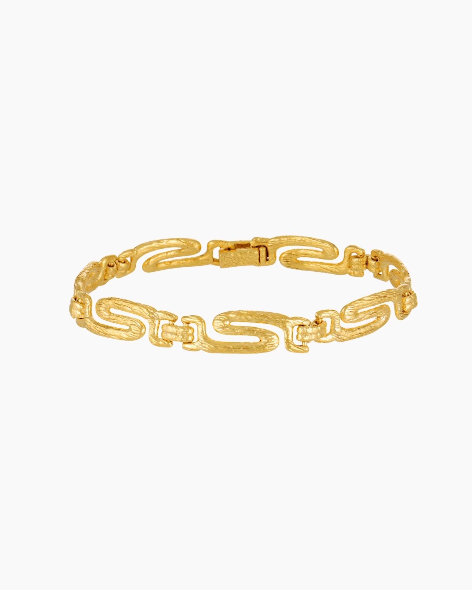 Gold chain bracelet with textured oval links and clasp, designed for women seeking a timeless statement bracelet for everyday wear, layering, and long-lasting quality.