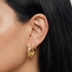 euro summer vintage inspired medium sized hoops with different gemstones like peridot green, canary yellow and white, dainty wavy textured huggie hoops with a small dainty white square cut gemstone in long lasting 18k gold