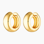 Close-up product image of polished gold Eva hoop earrings on a white background. This image is for women looking for timeless gold hoop earrings that are easy to style, comfortable for daily wear, and suitable for minimal or layered jewellery looks.