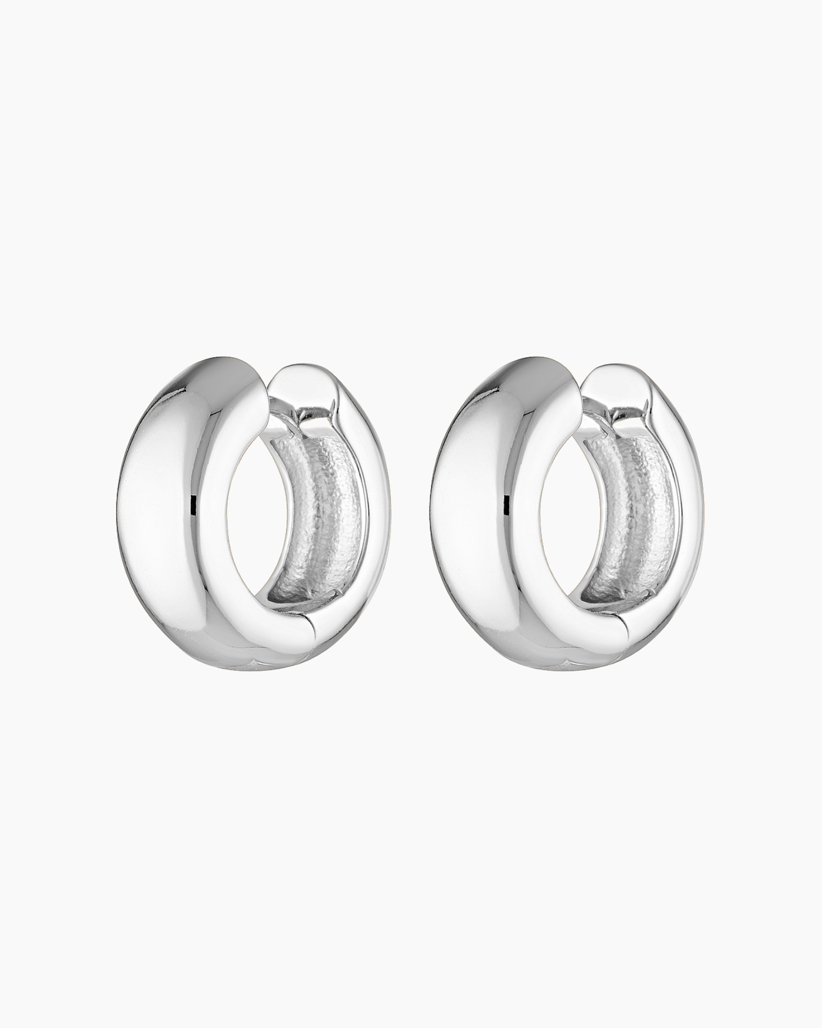 Silver Eva hoop earrings shown as a standalone product on a white background. For women searching for versatile silver hoop earrings suitable for daily wear, layering, and minimalist jewellery styling.