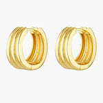 Gold hoop earrings shown as a pair on a white background, featuring a bold, sculpted multi-ridge design with a polished 18K gold finish. Designed for women seeking modern everyday gold hoops that feel refined yet impactful, these small statement earrings offer a comfortable, lightweight option for daily wear while elevating minimalist jewellery styling.