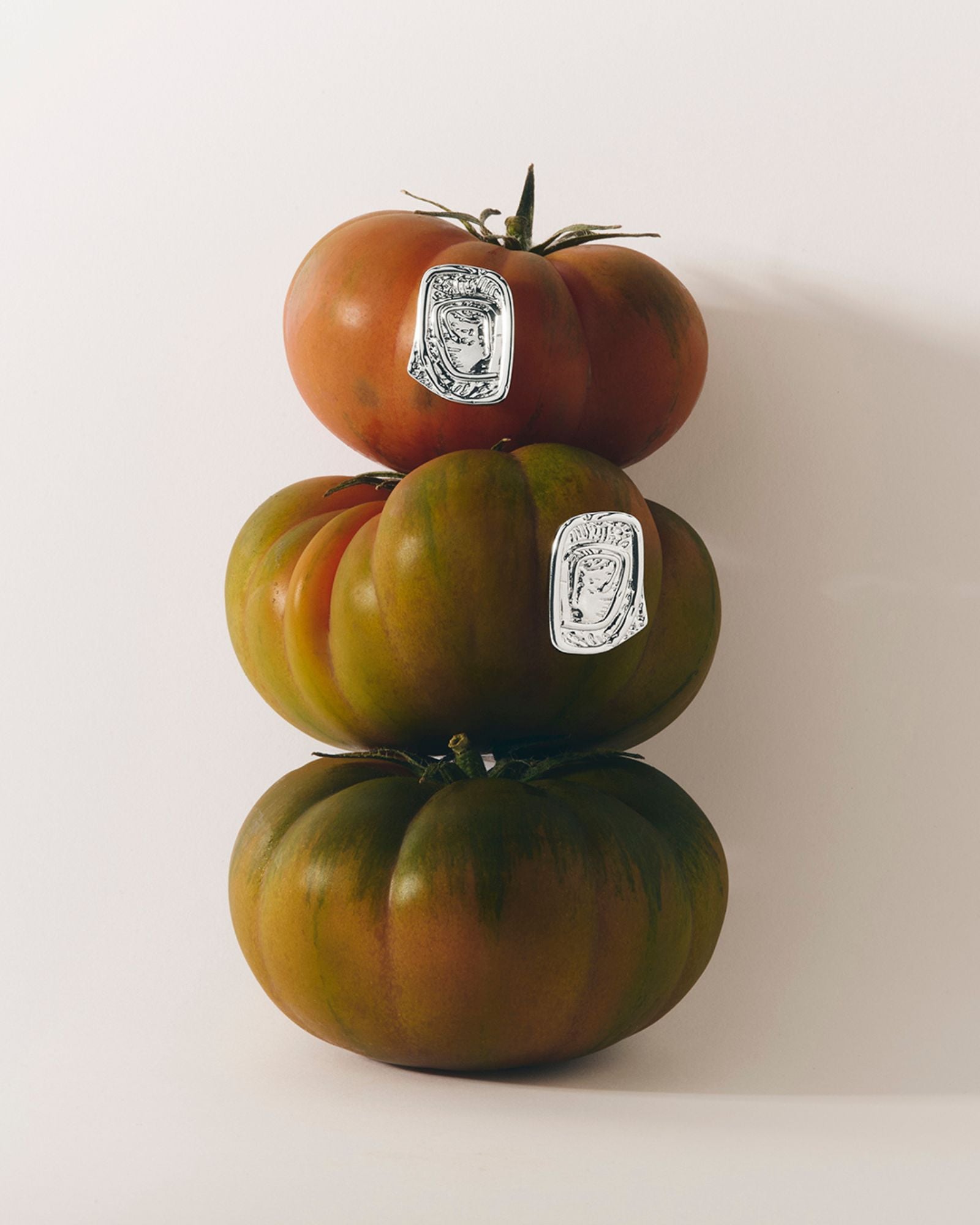 tomato stack with silver textured stud earrings

