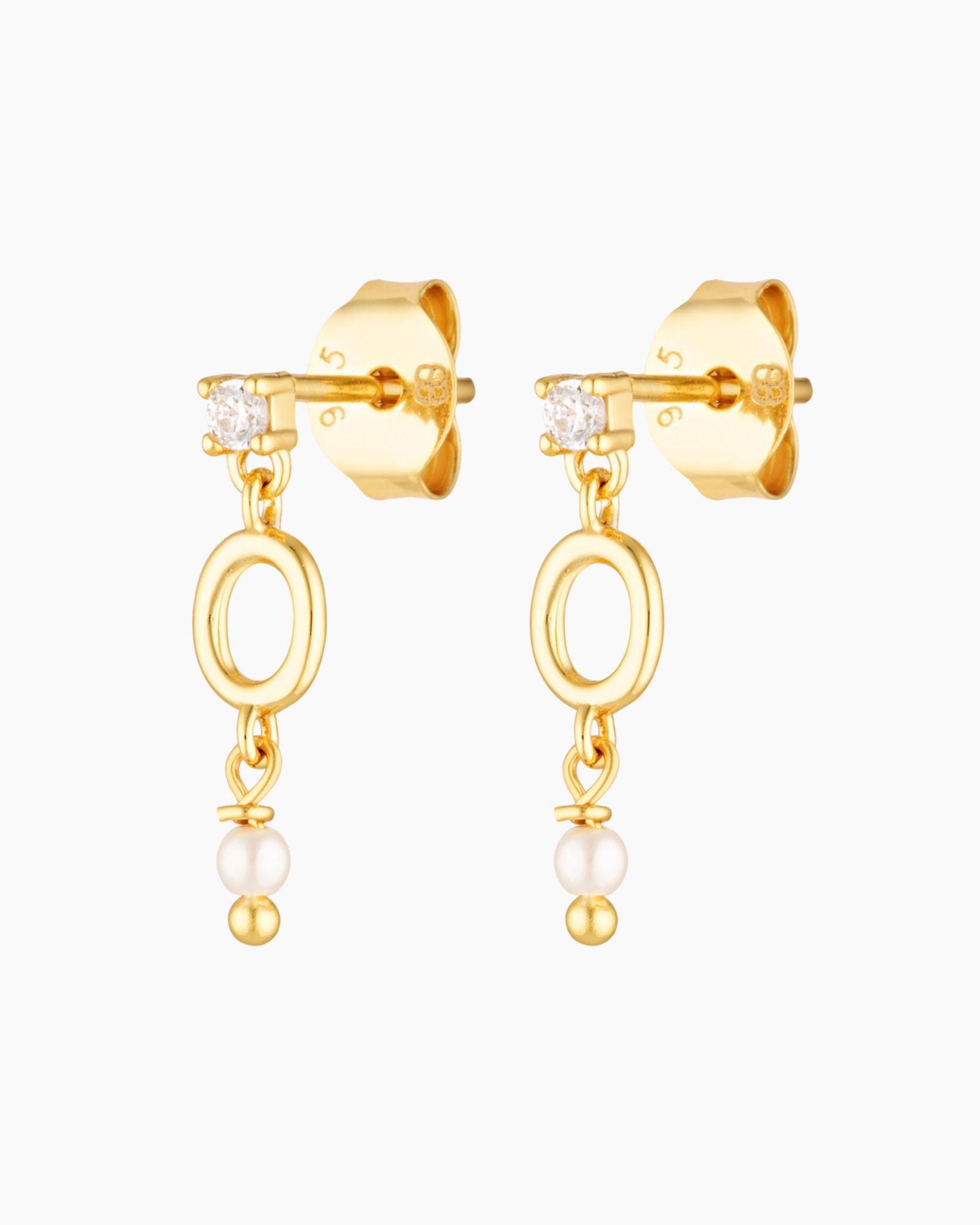 Gold stud earrings with cubic zirconia, an open oval link, and a small freshwater pearl drop, 18k gold plated sterling silver, photographed on a white background.