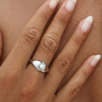 Sterling silver and gold pearl signet ring with a freshwater pearl, low-profile setting and polished minimalist band for everyday wear.