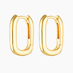 Pair of Sienna rectangle hoop earrings in polished 18k gold plating on a sterling silver base, shown on a white background with a hinged clasp and smooth rectangular silhouette. Designed for women seeking minimalist gold hoop earrings that are lightweight, hypoallergenic, and suitable for sensitive ears, these small rectangle huggie hoops offer a comfortable everyday earring option that is water and shower safe and easy to style alone or in an ear stack.