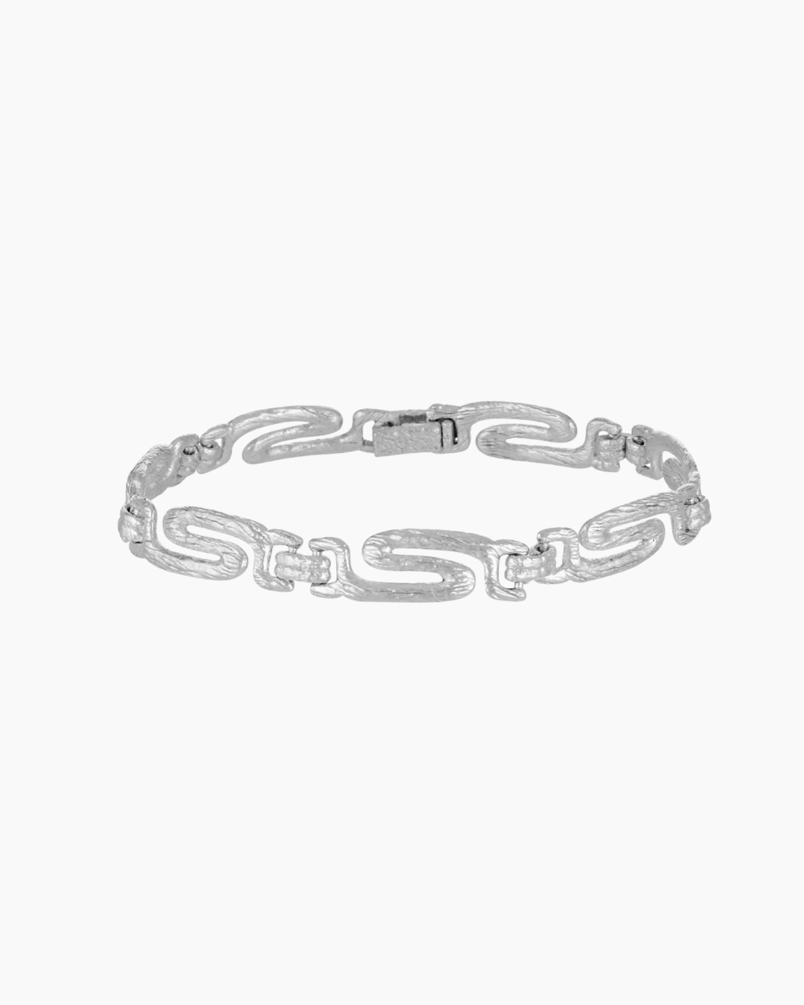 Product image of a silver textured chain bracelet with adjustable links and secure clasp, designed for women seeking a minimalist sterling silver bracelet for everyday wear and stacking.