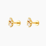gold flat back ear piercing with two white gemstones