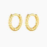 Pair of small textured gold hoop earrings with a hammered-style finish, photographed on a clean white background. Designed for women seeking minimalist everyday gold hoops that add subtle texture and interest while remaining lightweight, comfortable, and easy to style for daily wear and curated ear looks.