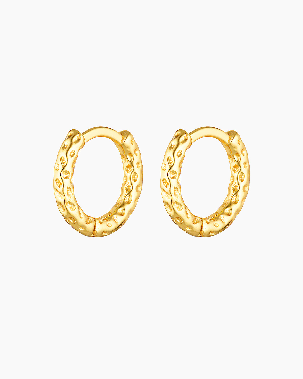 Pair of small textured gold hoop earrings with a hammered-style finish, photographed on a clean white background. Designed for women seeking minimalist everyday gold hoops that add subtle texture and interest while remaining lightweight, comfortable, and easy to style for daily wear and curated ear looks.