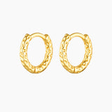 Pair of small textured gold hoop earrings with a hammered-style finish, photographed on a clean white background. Designed for women seeking minimalist everyday gold hoops that add subtle texture and interest while remaining lightweight, comfortable, and easy to style for daily wear and curated ear looks.