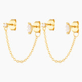 air of Zelia chain stud earrings featuring marquise and round cubic zirconia stones connected by a fine gold chain, 18k gold plated jewellery photographed on a white background.