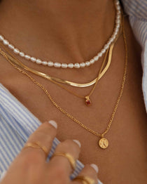 Necklace Stack: Aki Pearl, Serpent, Edel, and Luna Necklace