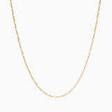 Minimal 18K gold-filled chain necklace photographed on a clean white background, featuring a fine elongated link design. Ideal for women seeking an everyday gold necklace for layering or wearing alone, offering a timeless, lightweight solution for effortless minimalist styling and water-safe daily wear.
