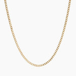 A gold-filled Cuban chain necklace with a lobster hook mechanism, displayed on a plain background.