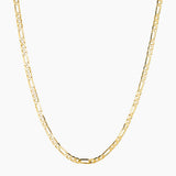 Gold Figaro chain necklace photographed on a clean white background, featuring classic alternating long and short links in a polished gold finish. Designed for women seeking a timeless gold chain necklace for everyday wear, layering, or minimalist styling. Ideal for customers looking for a durable, water-safe gold-filled Figaro necklace that adds effortless elegance to daily outfits and curated necklace stacks.