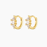 A pair of small gold-plated hoop earrings with a click-lock mechanism, featuring a solid sterling silver base and adorned with multiple small crystals.