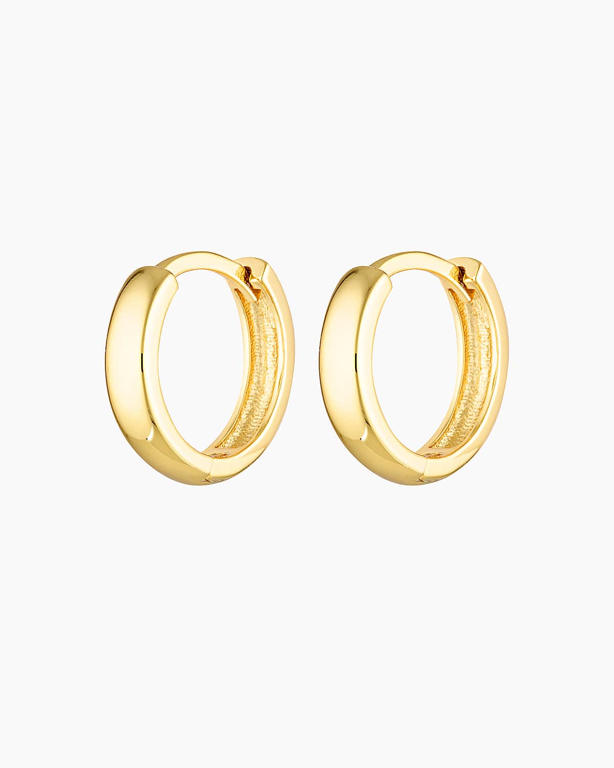 Studio product image of a pair of gold hoop earrings with a smooth, chunky curved profile and polished 18k gold-plated finish, shown front-facing on a clean white background with hinged clasp closure visible. Designed for women seeking small chunky gold hoop earrings, minimalist statement hoops, or hypoallergenic gold earrings for sensitive ears, this image highlights a refined everyday hoop that solves the need for a versatile, elevated earring that adds polish without overpowering an outfit.