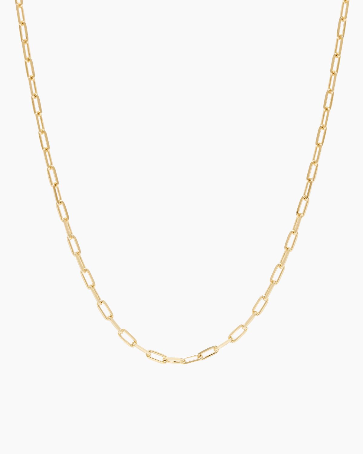 Product-only image of a gold rectangular link chain necklace displayed in a smooth U-shape against a clean white background. The oversized gold link design highlights a minimalist gold chain choker with a structured, modern silhouette. Designed for women seeking a versatile gold link necklace that adds polish to everyday outfits and solves the need for a bold yet wearable layering piece.