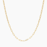 Product-only image of a gold rectangular link chain necklace displayed in a smooth U-shape against a clean white background. The oversized gold link design highlights a minimalist gold chain choker with a structured, modern silhouette. Designed for women seeking a versatile gold link necklace that adds polish to everyday outfits and solves the need for a bold yet wearable layering piece.