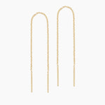 Pair of gold rolo chain threader earrings displayed on a clean white background, featuring slim bar ends and delicate elongated chains. Designed for people who prefer minimalist, lightweight jewellery, these thread earrings offer an elegant solution for creating a refined, modern look without bulky hardware. Ideal for everyday wear, sensitive ears, and effortless styling with dainty gold jewellery and layered ear stacks.