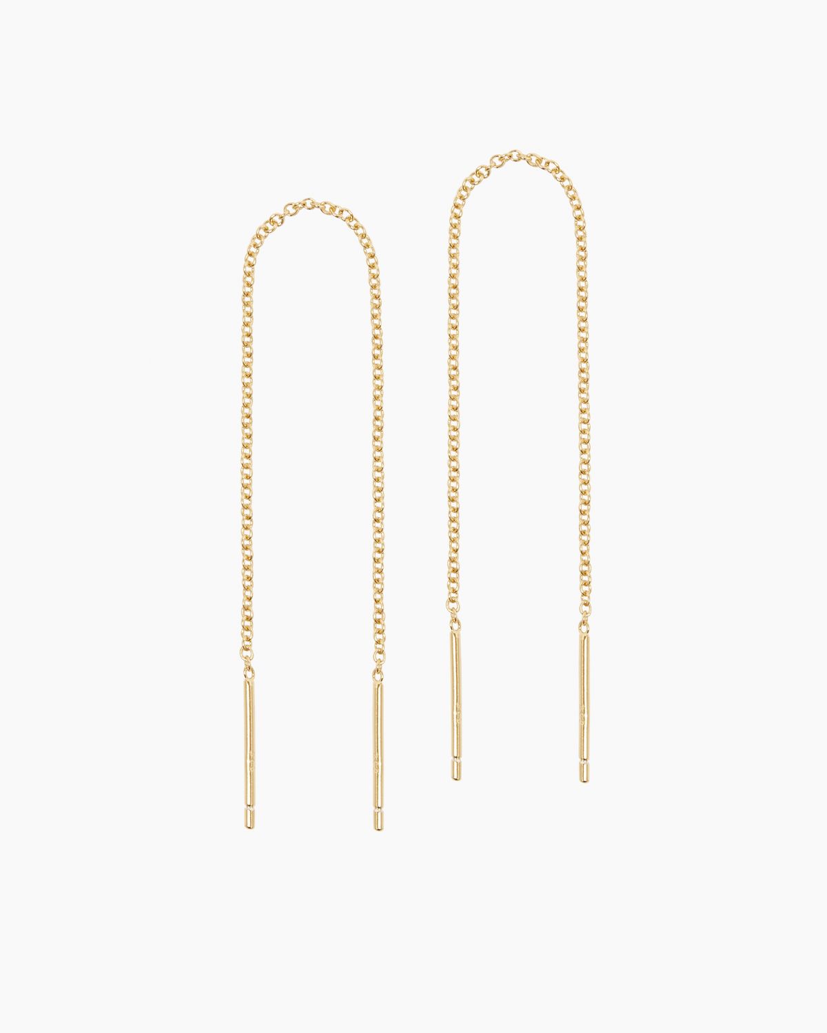 Pair of gold rolo chain threader earrings displayed on a clean white background, featuring slim bar ends and delicate elongated chains. Designed for people who prefer minimalist, lightweight jewellery, these thread earrings offer an elegant solution for creating a refined, modern look without bulky hardware. Ideal for everyday wear, sensitive ears, and effortless styling with dainty gold jewellery and layered ear stacks.