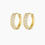 Studio product image of Tia crystal gold hoop earrings featuring small round hoops set with rows of clear cubic zirconia stones on a polished gold finish. Designed for women seeking lightweight, hypoallergenic gold hoop earrings that add refined sparkle for everyday wear, sensitive ears, and effortless ear stacking.