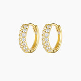 Studio product image of Tia crystal gold hoop earrings featuring small round hoops set with rows of clear cubic zirconia stones on a polished gold finish. Designed for women seeking lightweight, hypoallergenic gold hoop earrings that add refined sparkle for everyday wear, sensitive ears, and effortless ear stacking.