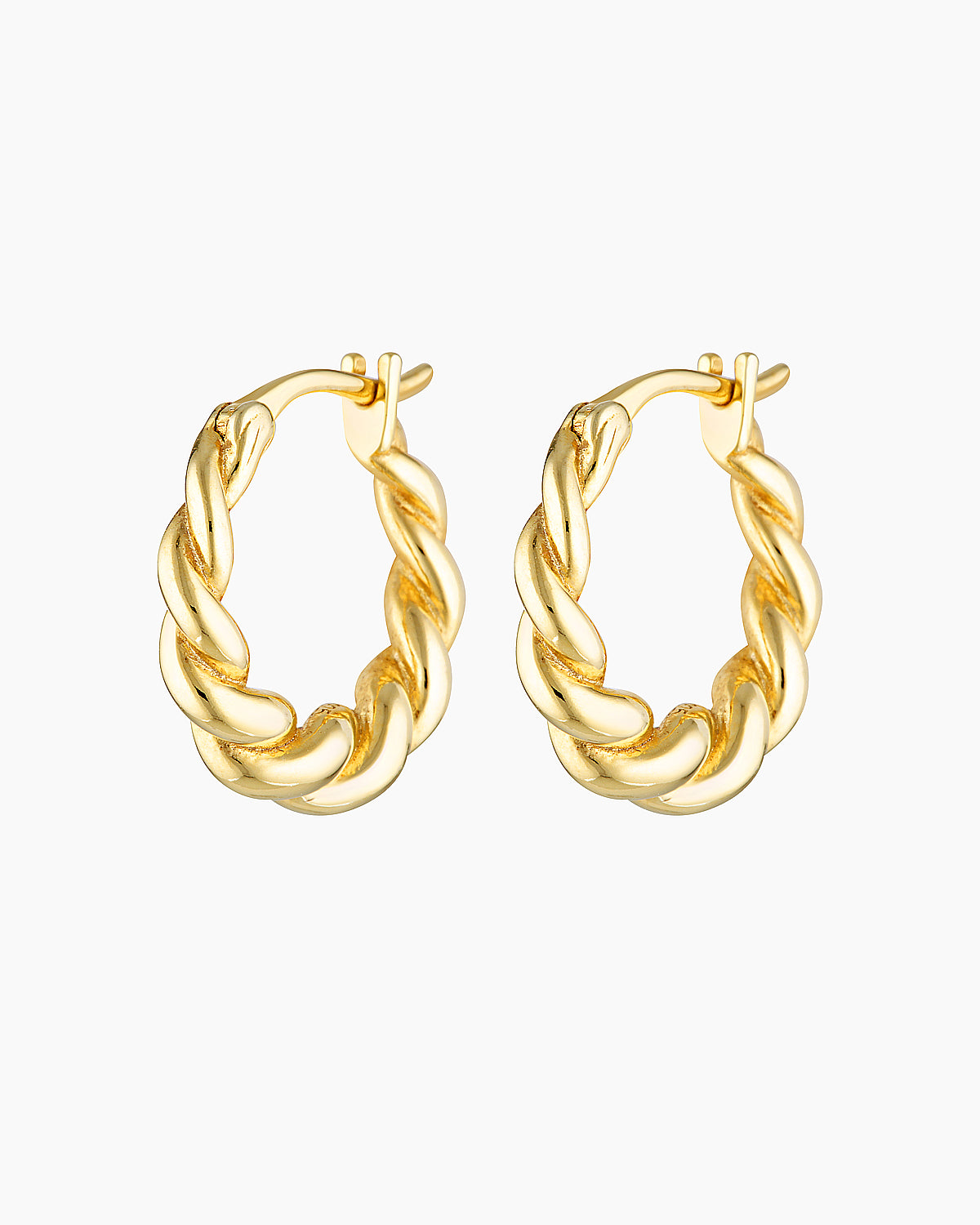 Product-only image of a pair of twisted gold hoop earrings with a polished, semi-bold braided design and a hinged clasp, shown on a white background. These gold hoop earrings are designed for people seeking medium-sized statement hoops that remain lightweight and comfortable, offering an elevated everyday option that adds texture and impact without overpowering minimalist or layered ear styling.